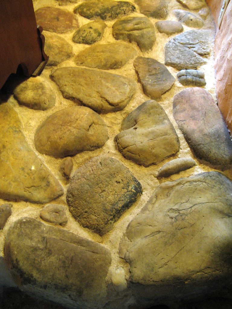 This is part of the cobblestone floor. All of the rocks used came from the property. They weren't so difficult to find, as people who had come before had collected stones into giant piles. We just had to sort through them and find the smooth ones.
